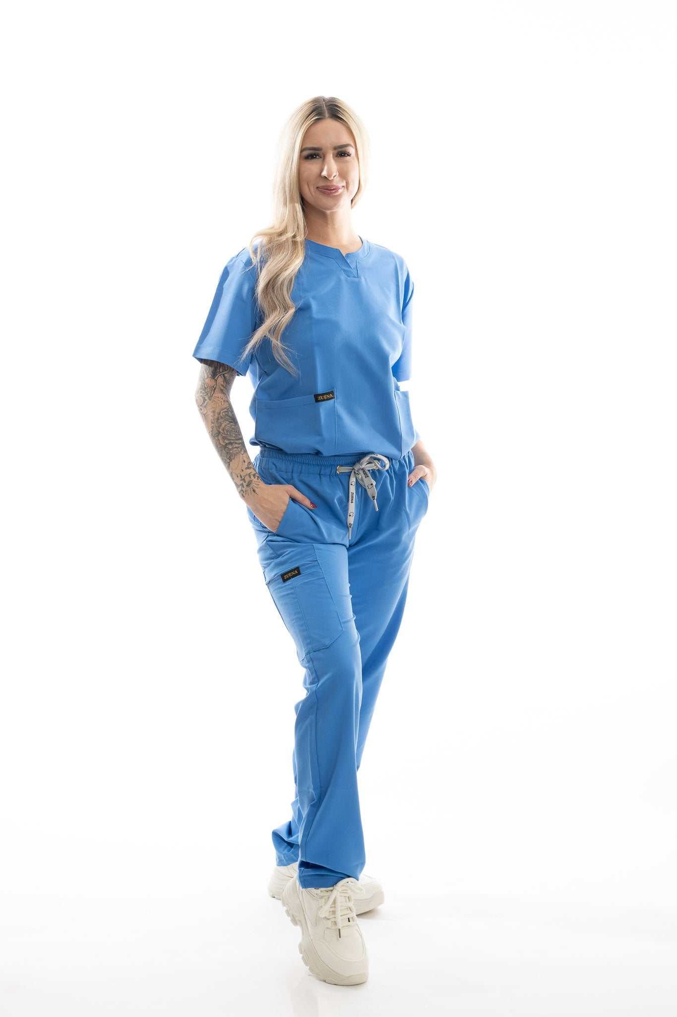professional scrubs Skyward Bound Scrubs Set in blue worn by model