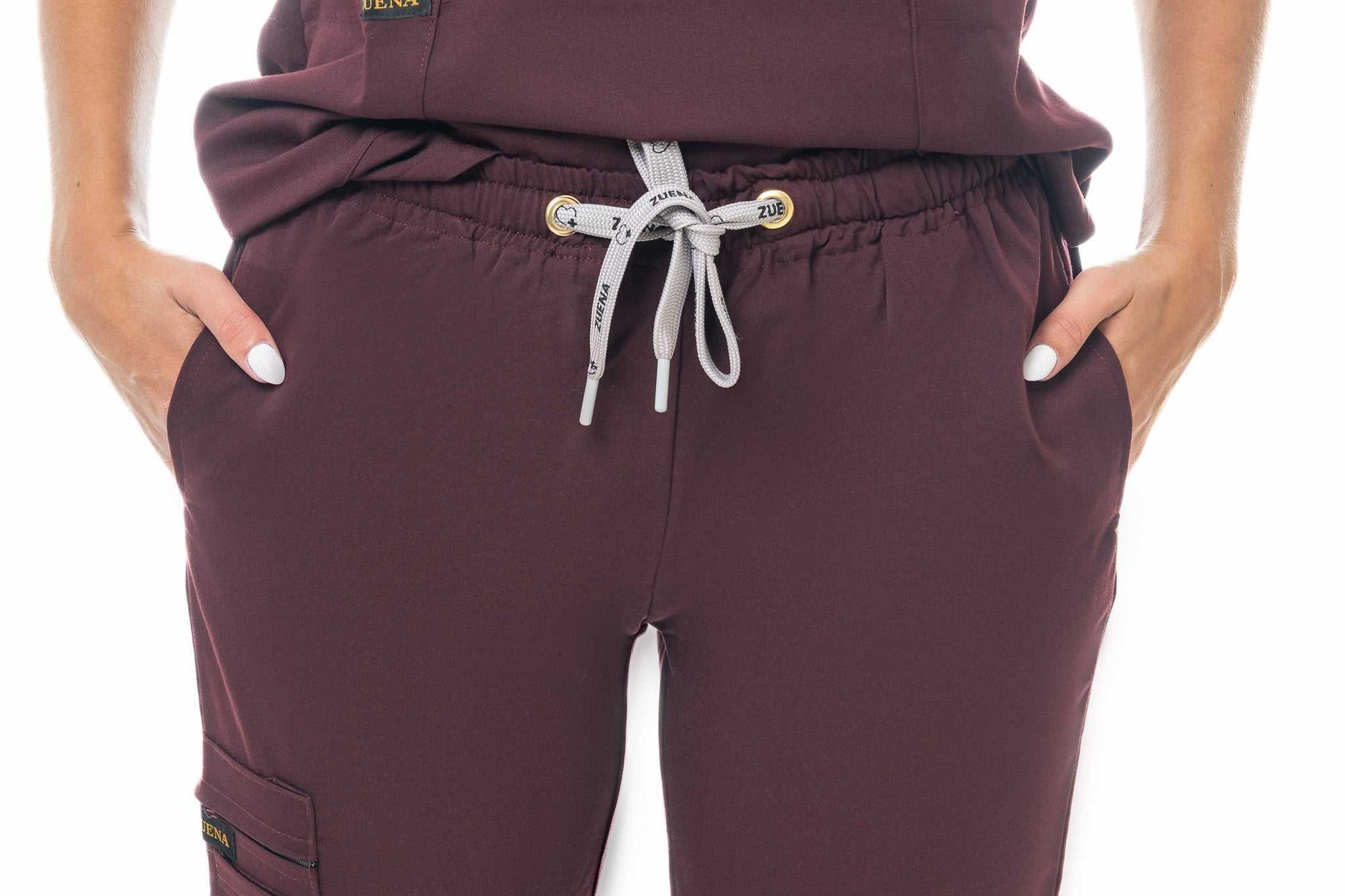 Maroon pants with a drawstring waistband on a white background