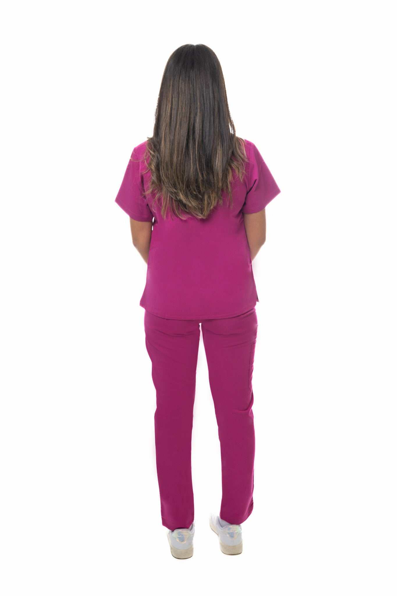 Back view of a healthcare professional wearing Zuena Rose Petal Scrub Pants in pink with elastic waistband and multiple pockets for comfort and durability